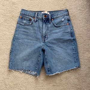 Mid length high rise denim shorts